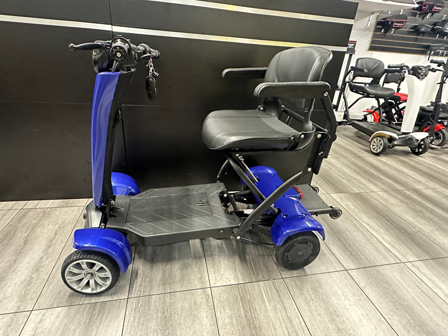 QUADRIPORTEUR CONFORTABLE PLIABLE À TÉLÉCOMMANDE AUTOMATIQUE 500Watt
